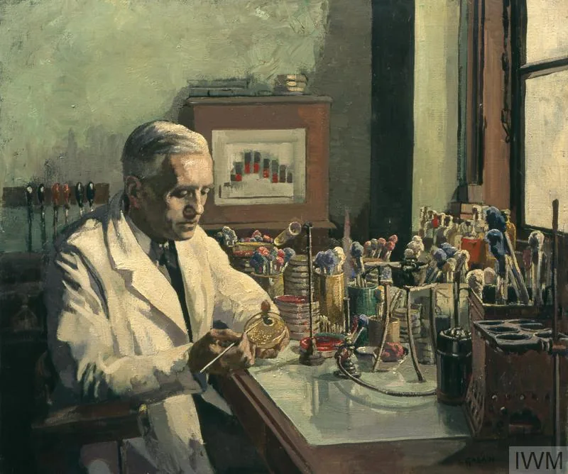 Portrait of Alexander Fleming at the bench in his laboratory at St Mary's. (Wellcome Collection / public-domain candidates.)