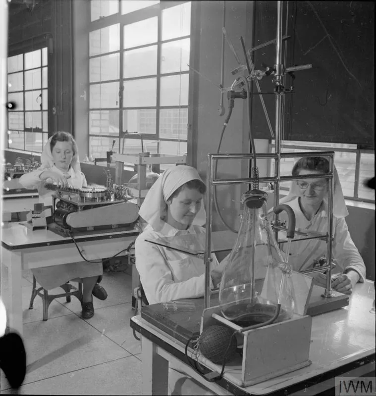 Ernst Chain and/or Norman Heatley at work (portrait or laboratory).