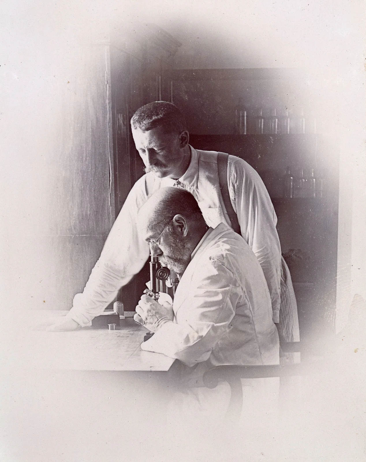 Robert Koch and Richard Pfeiffer working in a laboratory during the Bombay plague investigations, 1897. Wellcome Collection, Public Domain Mark. WP media **509**.